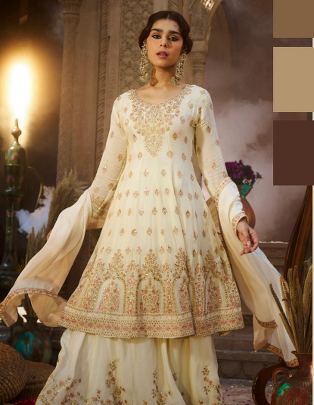 Ivory fabric with fine gold embroidery